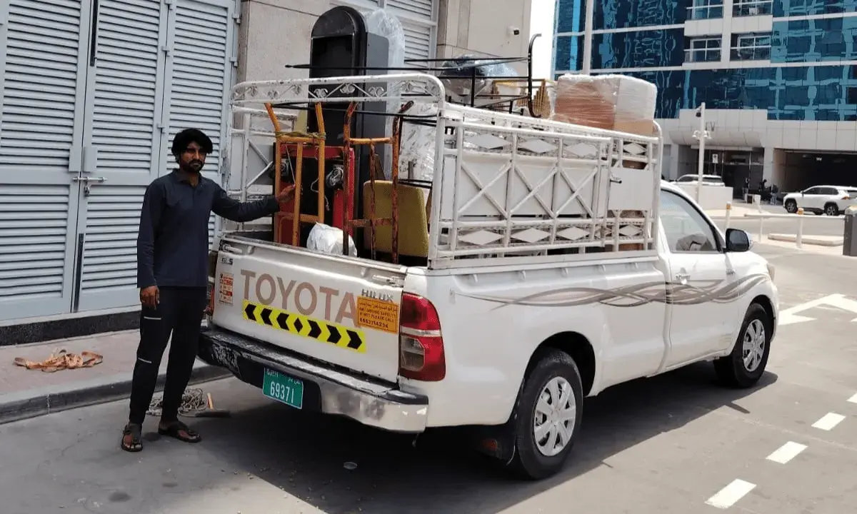 Jhangir Khan, owner of Movers In Dubai, supervising a household move in Dubai Silicon Oasis